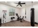 This workout room includes weights, exercise equipment, and carpet floors at 1525 W Bent Tree Dr, Phoenix, AZ 85085