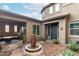 Beautiful front entrance featuring a fountain, covered patio, and brick-paved courtyard at 1525 W Bent Tree Dr, Phoenix, AZ 85085