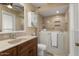 Accessible bathroom designed for comfort, featuring a walk-in tub and vanity at 15621 N Lakeforest Dr, Sun City, AZ 85351