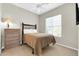 This cozy bedroom features a large window, neutral walls, and a stylish dresser, creating a serene space at 16420 N Thompson Peak Pkwy # 1064, Scottsdale, AZ 85260