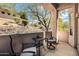 Relaxing outdoor patio with seating, covered for comfort, and views of the natural surroundings at 16420 N Thompson Peak Pkwy # 1064, Scottsdale, AZ 85260