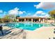 Resort-style pool and tanning deck with a covered lounge area to enjoy the beautiful desert weather at 16420 N Thompson Peak Pkwy # 1064, Scottsdale, AZ 85260