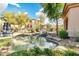 Water feature with desert landscaping for residents to enjoy as they lounge by the pool at 16420 N Thompson Peak Pkwy # 1064, Scottsdale, AZ 85260