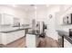 Spacious kitchen with white cabinetry, stainless steel appliances, and a central island at 17203 E Starflower Ct, Queen Creek, AZ 85142