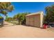 Property featuring a convenient storage shed and gated access at 17203 E Starflower Ct, Queen Creek, AZ 85142