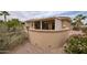 Comfortable backyard patio shaded by an awning, with seating options for relaxing outdoors at 17335 W Gould Mine Ln, Surprise, AZ 85387