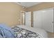 Bedroom featuring a sliding door closet and neutral colored walls at 17335 W Gould Mine Ln, Surprise, AZ 85387