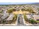 Community aerial view highlighting the arrangement of homes and green spaces in a well-planned neighborhood at 17423 W Yavapai St, Goodyear, AZ 85338