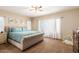 Serene bedroom featuring a plush bed and soft natural light at 17423 W Yavapai St, Goodyear, AZ 85338