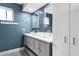 Stylish bathroom featuring a double vanity, modern fixtures, and decorative tiles, creating a serene atmosphere at 2065 E Alameda Dr, Tempe, AZ 85282