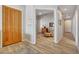 Inviting entryway featuring a wood door and tile flooring flowing into the rest of the home at 20802 N Grayhawk Dr # 1017, Scottsdale, AZ 85255