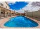 Private backyard oasis with a refreshing in-ground pool and plenty of space for outdoor activities at 21 W Red Mesa Trl, San Tan Valley, AZ 85143