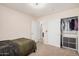 Nicely carpeted bedroom features a closet and view to the bathroom at 21 W Red Mesa Trl, San Tan Valley, AZ 85143