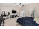 Primary bedroom featuring a ceiling fan, television, and staircase access at 21 W Red Mesa Trl, San Tan Valley, AZ 85143