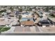 Aerial view of the home showcasing the backyard pool, surrounding neighborhood, and proximity to local amenities at 2110 W Pampa Ave, Mesa, AZ 85202