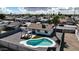 Aerial view of a backyard featuring a modern pool, patio, and well-maintained landscaping at 2110 W Pampa Ave, Mesa, AZ 85202