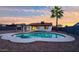 Inviting backyard featuring a sparkling pool, gazebo, and lush palm tree, perfect for outdoor relaxation and entertaining at 2110 W Pampa Ave, Mesa, AZ 85202