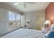 Bright bedroom with city view and a glimpse of an en-suite tiled bathroom at 2201 N Central Ave # 11A, Phoenix, AZ 85004