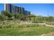 Scenic view of Republic Garden showcasing the garden's lush green lawn, colorful plants, and seating area at 2201 N Central Ave # 11A, Phoenix, AZ 85004