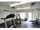 Well-equipped fitness center featuring a treadmill, elliptical, weights, and workout bench at 2201 N Central Ave # 11A, Phoenix, AZ 85004