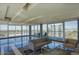 Bright and spacious living room with floor-to-ceiling windows offering panoramic city views at 2201 N Central Ave # 11A, Phoenix, AZ 85004