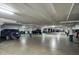 Well-lit, covered parking garage with clearly marked spaces for convenient and secure vehicle storage at 2201 N Central Ave # 11A, Phoenix, AZ 85004