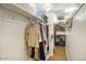 Organized walk-in closet featuring ample hanging space, shelving, and shoe storage for optimal organization at 2201 N Central Ave # 11A, Phoenix, AZ 85004