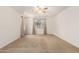 Cozy bedroom with plush carpet, ceiling fan and window at 22624 S 224Th Pl, Queen Creek, AZ 85142
