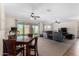 View from the dining area into the living room at 22624 S 224Th Pl, Queen Creek, AZ 85142