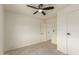 This bedroom features modern flooring, neutral walls, and a stylish ceiling fan for comfort at 241 S 54Th St, Mesa, AZ 85206