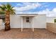 Attractive white home featuring a gated front entrance and xeriscaped front yard for low maintenance at 241 S 54Th St, Mesa, AZ 85206