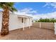 Charming home exterior with a white picket fence and a well-maintained gravel yard at 241 S 54Th St, Mesa, AZ 85206