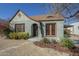 Charming home featuring a quaint front yard, unique architectural details, and inviting curb appeal at 2538 N 8Th St, Phoenix, AZ 85006