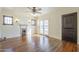 Bright living room featuring hardwood floors, fireplace, and french doors to maximize natural light at 2538 N 8Th St, Phoenix, AZ 85006