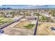 Wide aerial shot of home showing desert landscape, block fence, empty lot, and neighborhood at 25903 S Lemon Ave, Queen Creek, AZ 85142