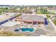 Aerial view of backyard showing desert landscaping, pool, patio, and covered structure at 25903 S Lemon Ave, Queen Creek, AZ 85142