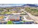 Aerial view of the home showing the backyard pool, mature trees and desert landscape at 25903 S Lemon Ave, Queen Creek, AZ 85142