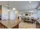 Bright open kitchen leading to the dining and living rooms, perfect for entertaining at 25903 S Lemon Ave, Queen Creek, AZ 85142