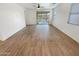 A spacious living room with tile floors and sliding glass doors leading to the backyard at 25912 N Langley Dr, Peoria, AZ 85383