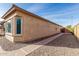 Exterior shot featuring a walkway, stucco and a low-maintenance desert rock yard at 25983 W Escuda Dr, Buckeye, AZ 85396