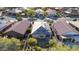 Aerial view of houses with solar panels and well-maintained yards at 27138 W Escuda Dr, Buckeye, AZ 85396