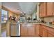 Kitchen area featuring stainless steel appliances, granite countertops, and ample cabinet space at 27138 W Escuda Dr, Buckeye, AZ 85396