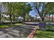 Street view of the Sage Recreation Center featuring directional signage and lush landscaping at 27138 W Escuda Dr, Buckeye, AZ 85396