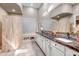 Bright bathroom showcasing a double vanity, a spacious shower, and neutral finishes at 3108 W Ravina Ln, Anthem, AZ 85086