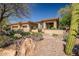 Attractive single-story home features a low-maintenance desert landscape, a two-car garage, and neutral tones at 3108 W Ravina Ln, Anthem, AZ 85086