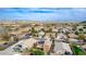 Attractive aerial image of a desert community with a mix of homes and local park at 3317 W Knudsen Dr, Phoenix, AZ 85027