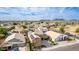 Aerial view of a home with solar panels and desert landscaping in a residential neighborhood at 3317 W Knudsen Dr, Phoenix, AZ 85027