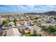 Aerial view of a desert neighborhood showcasing the variety of single-Gathering homes and landscaping at 3317 W Knudsen Dr, Phoenix, AZ 85027