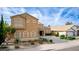 Two-story home with neutral color scheme, long driveway, and well-maintained landscaping at 3317 W Knudsen Dr, Phoenix, AZ 85027