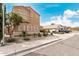 Beautiful two-story home featuring desert landscaping, tan paint and shutters, and square accents at 3317 W Knudsen Dr, Phoenix, AZ 85027